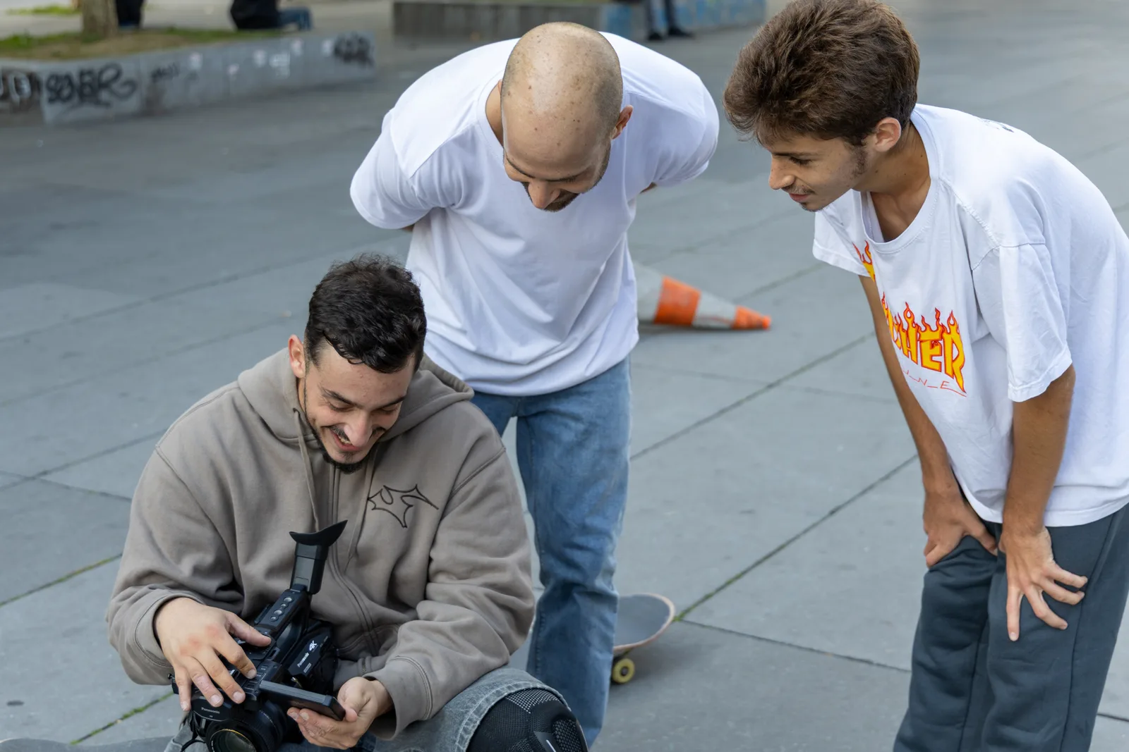 Sharing a laugh while checking the footage in Paris