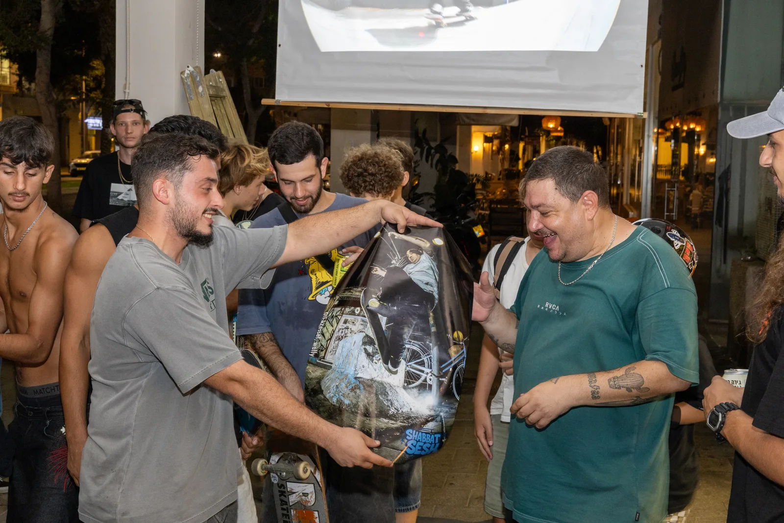 A skater receiving his SHABBAT SESH print
