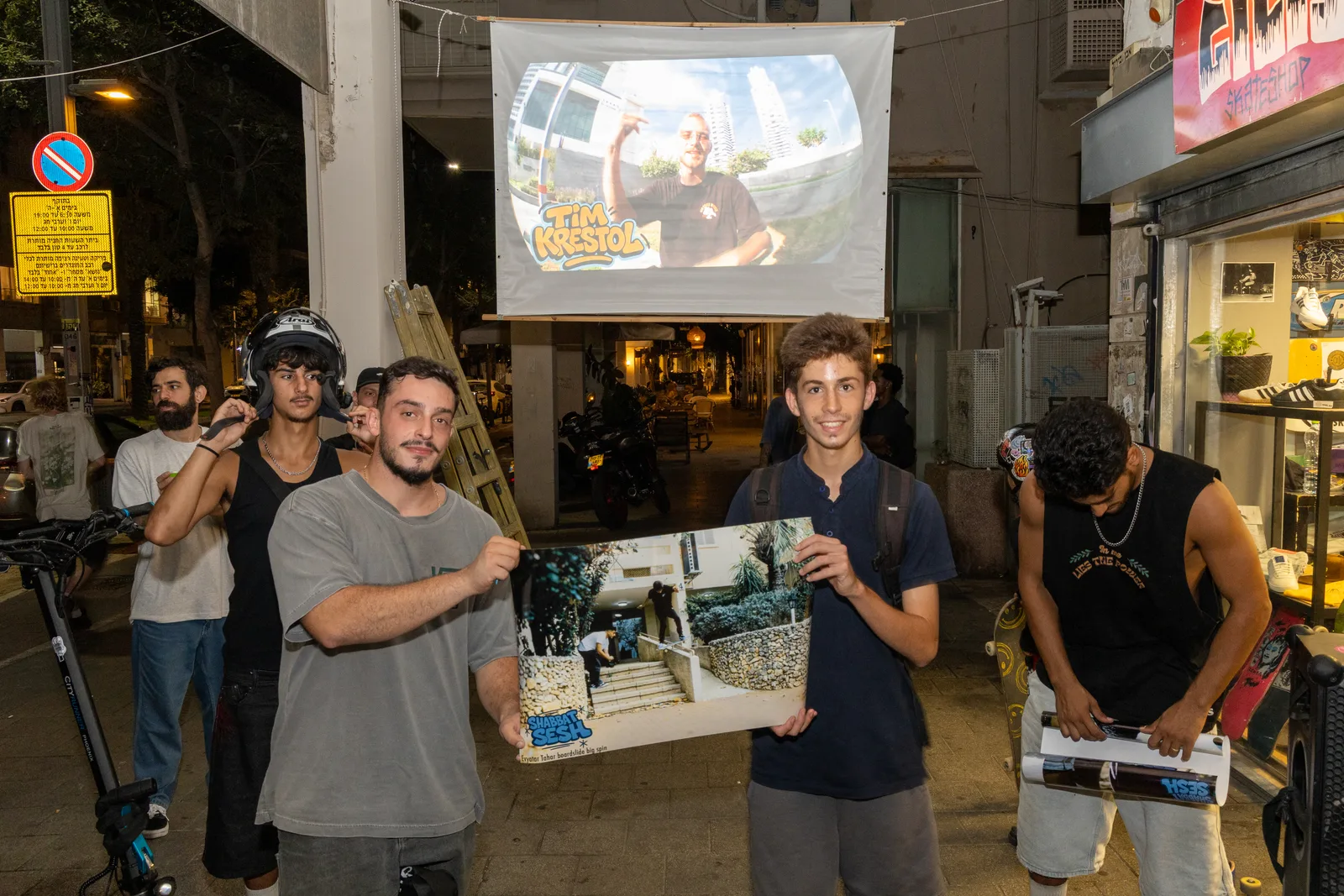 Celebrating with a printed photograph at Gilis